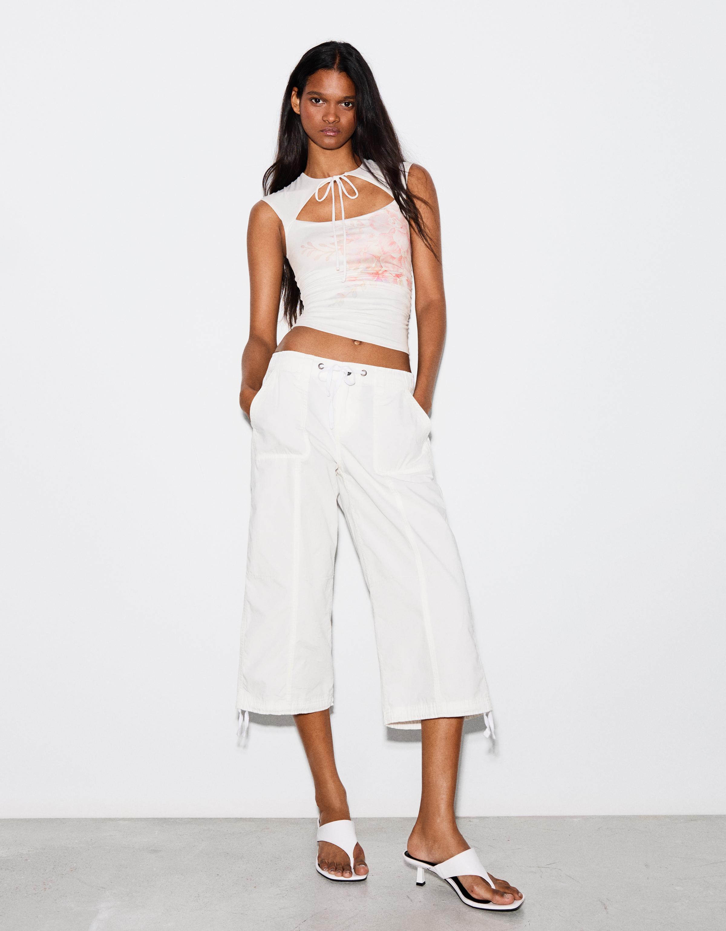 Floral print split top — Cream