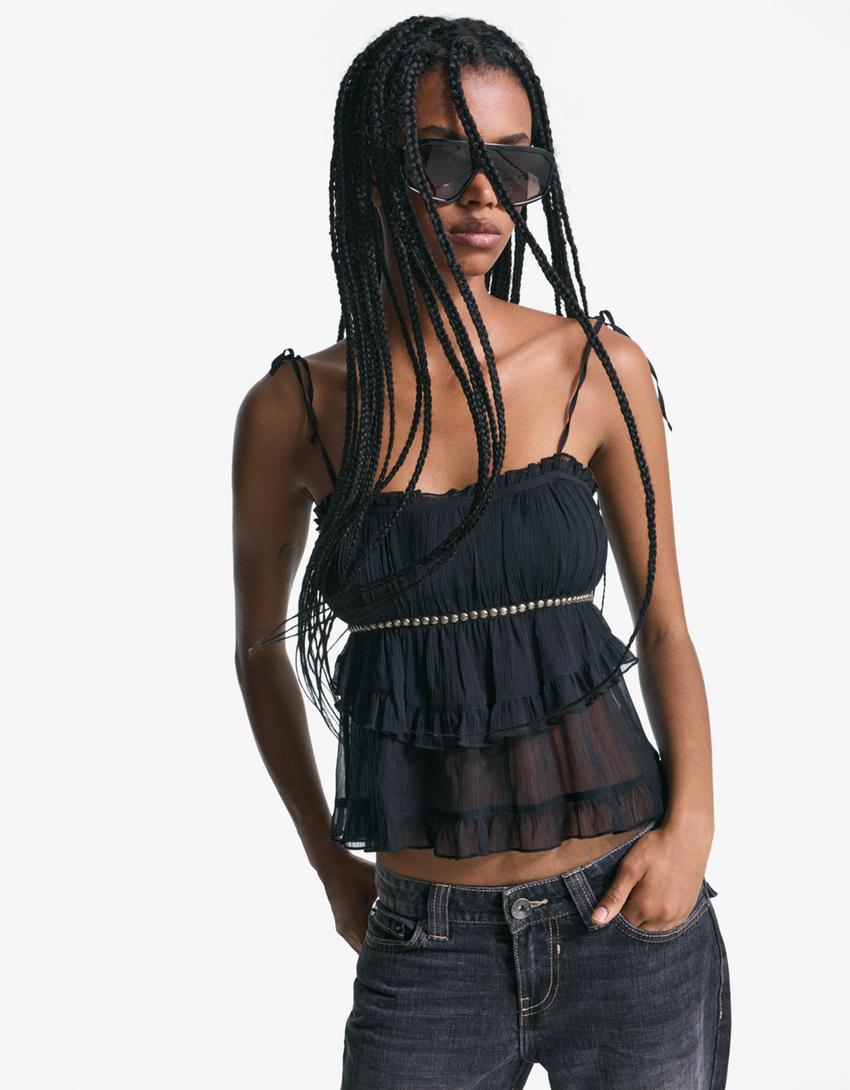 Rustieke top met bandjes en studs-Zwart