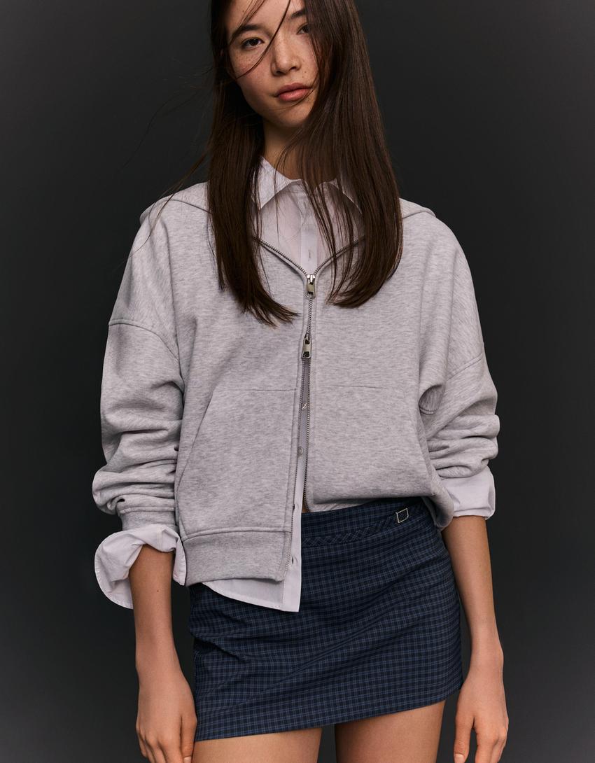 Saia-calça mini com fivela-Marinho