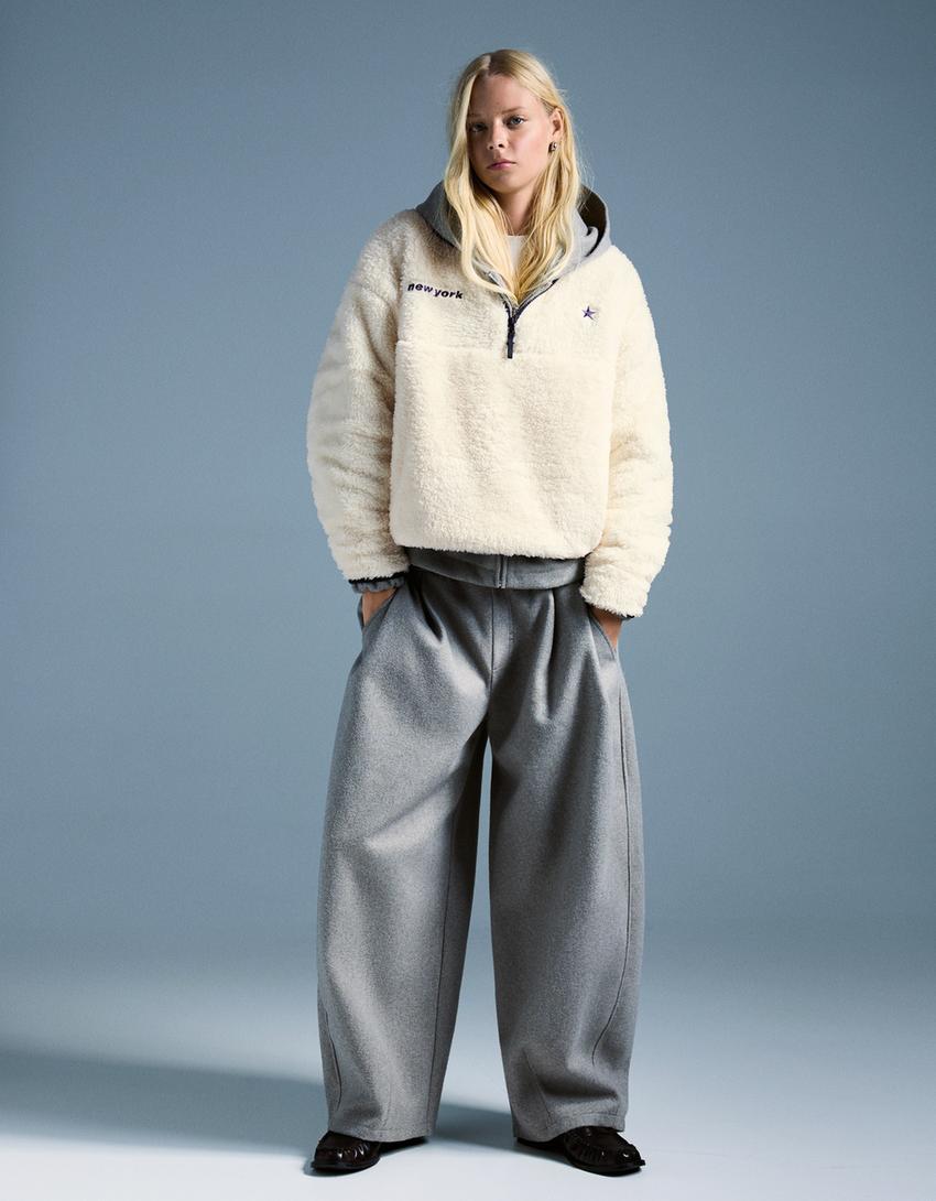 سويتر بسحّاب وتأثير فرو الغنم وحافة سفلية قابلة للتعديل-كريمي