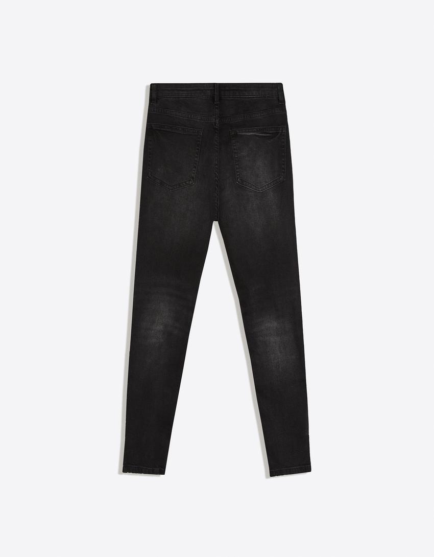 Carrot fit jeans met scheuren-Zwart