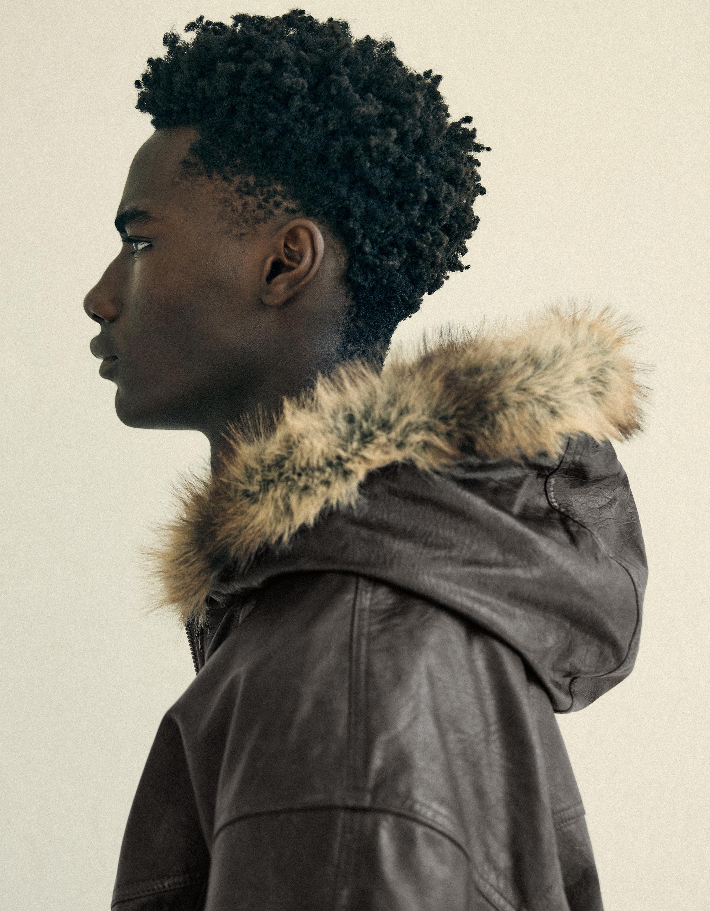 Leather effect jacket with faux fur hood — Brown