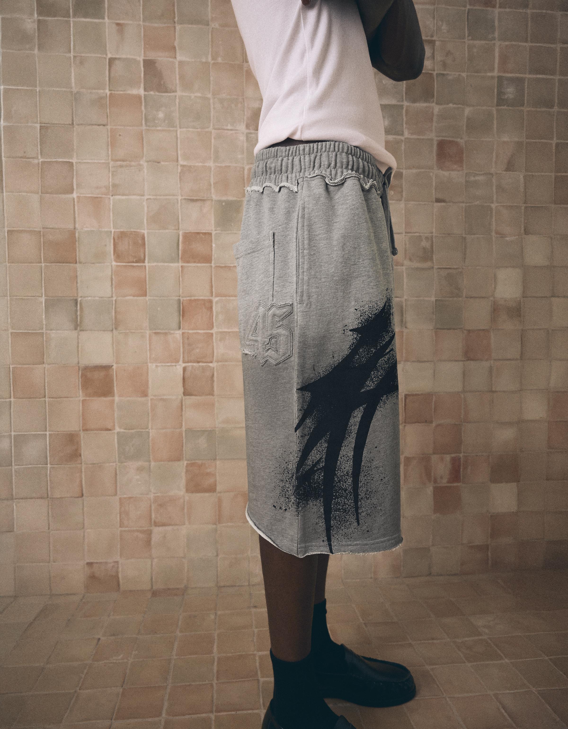 Washed jersey Bermuda shorts with print — Grey