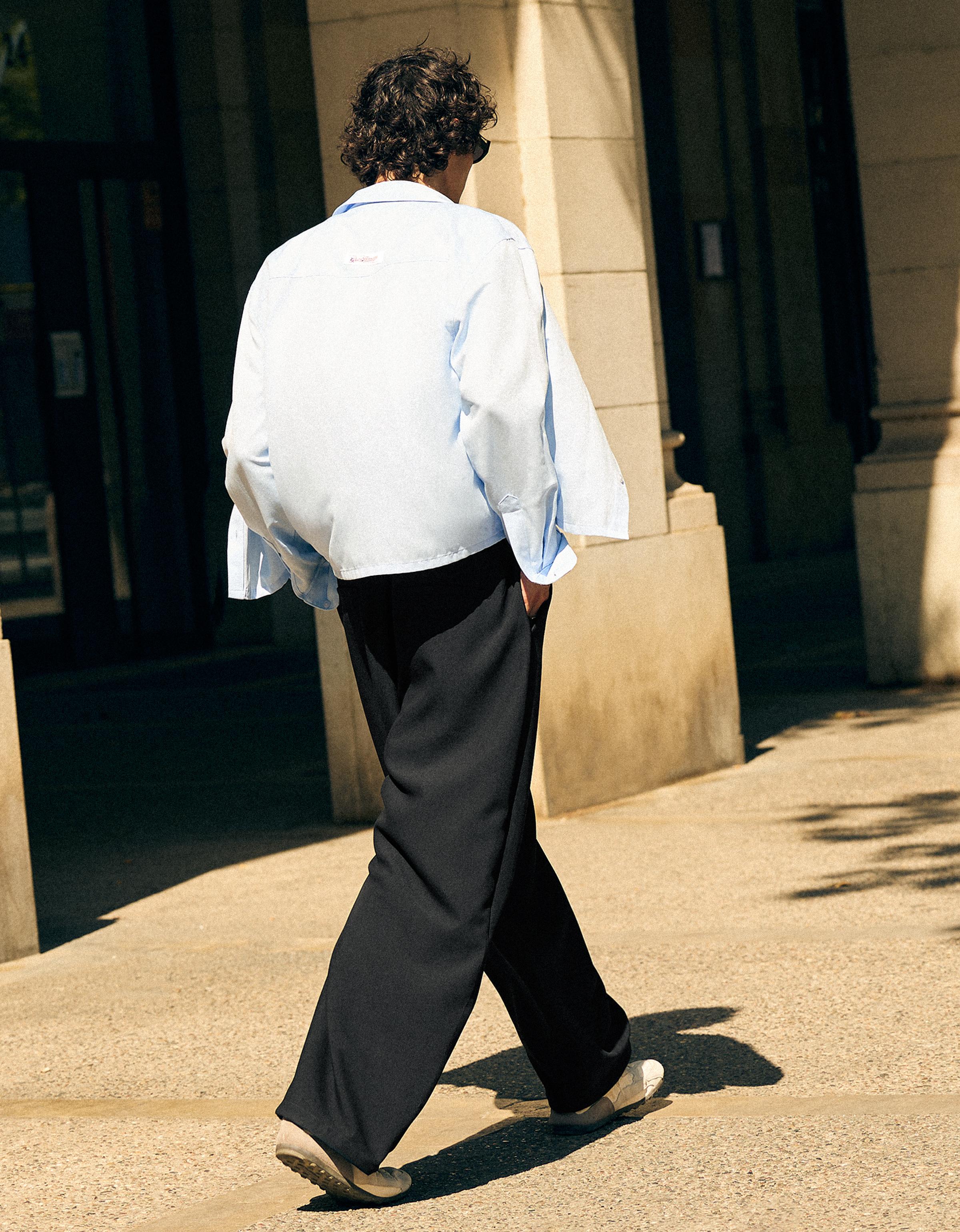 Barrel-leg trousers with darts and belt — Black