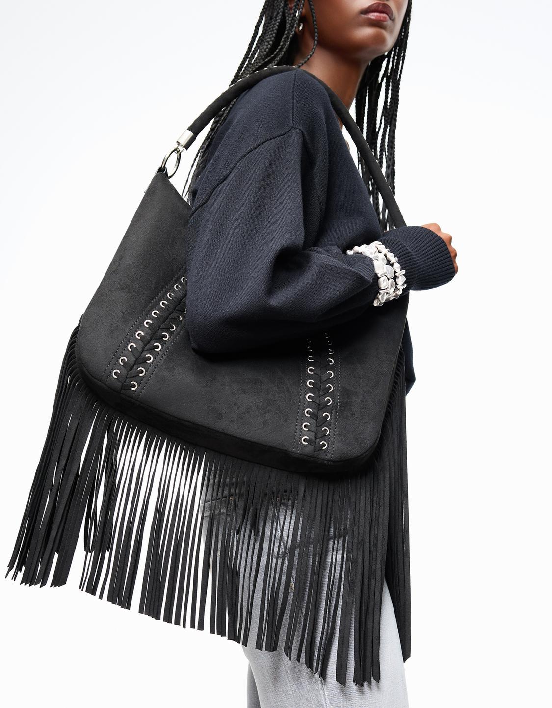 Fringed faux suede bag with eyelets