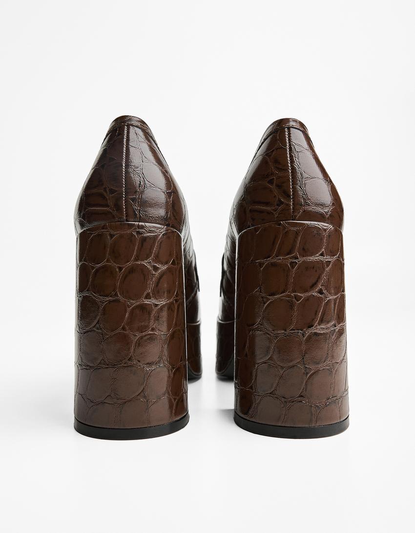 Gehakte mocassin met plateauzool-Bruin