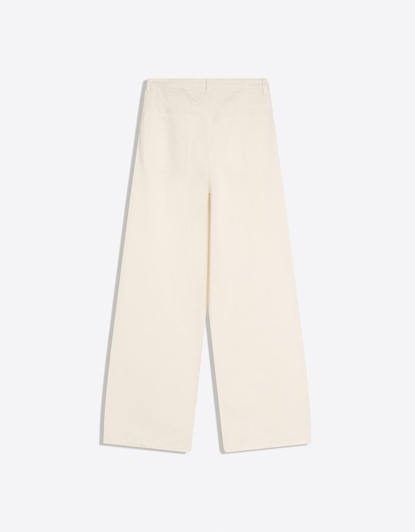 Çapraz bel detaylı yüksek bel geniş paça jean-Krem