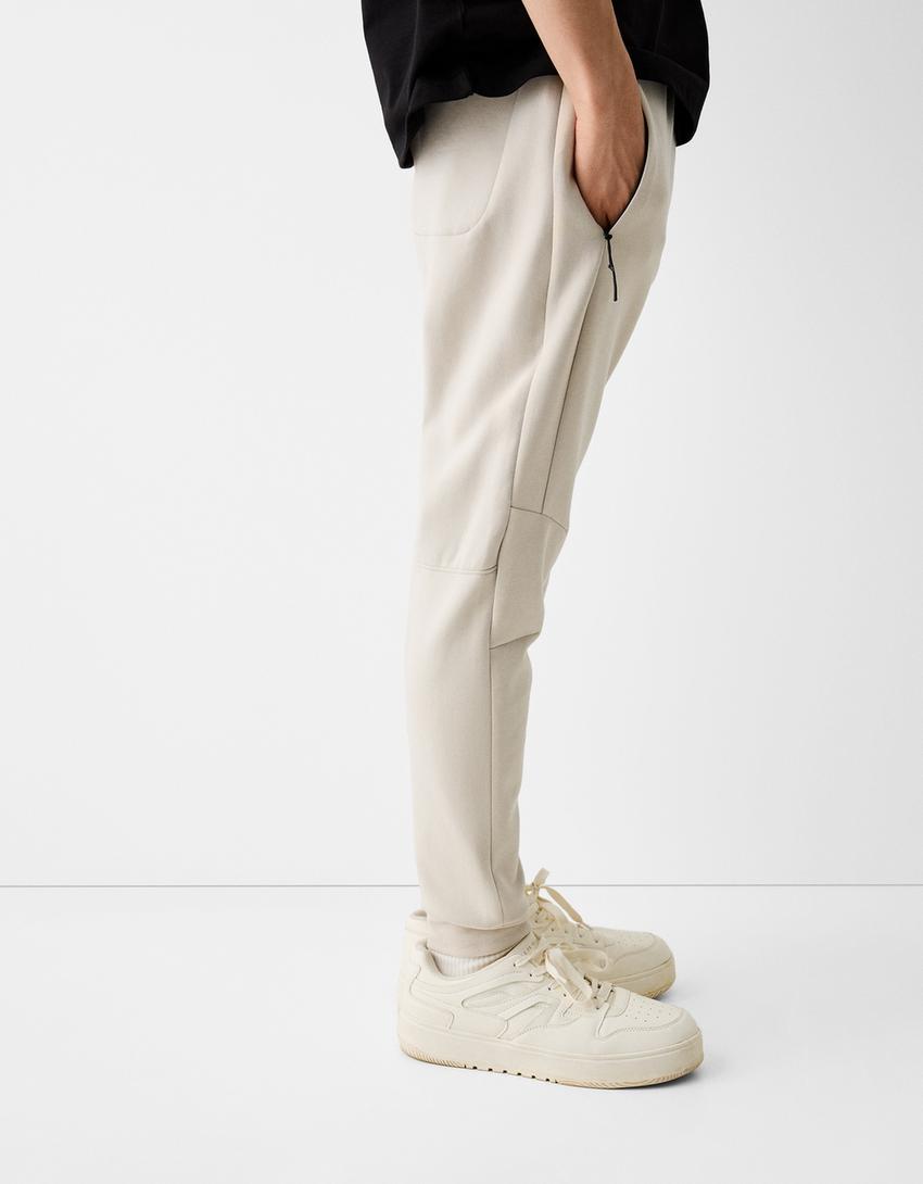 Calças jogger felpa cortes-Gelo-3