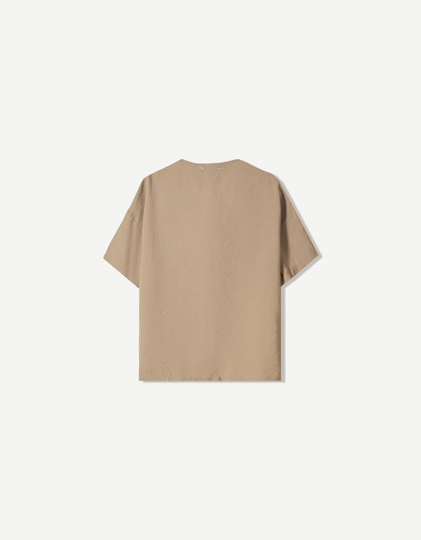 Oversized soepelvallende blouse met korte mouw-Zand-5