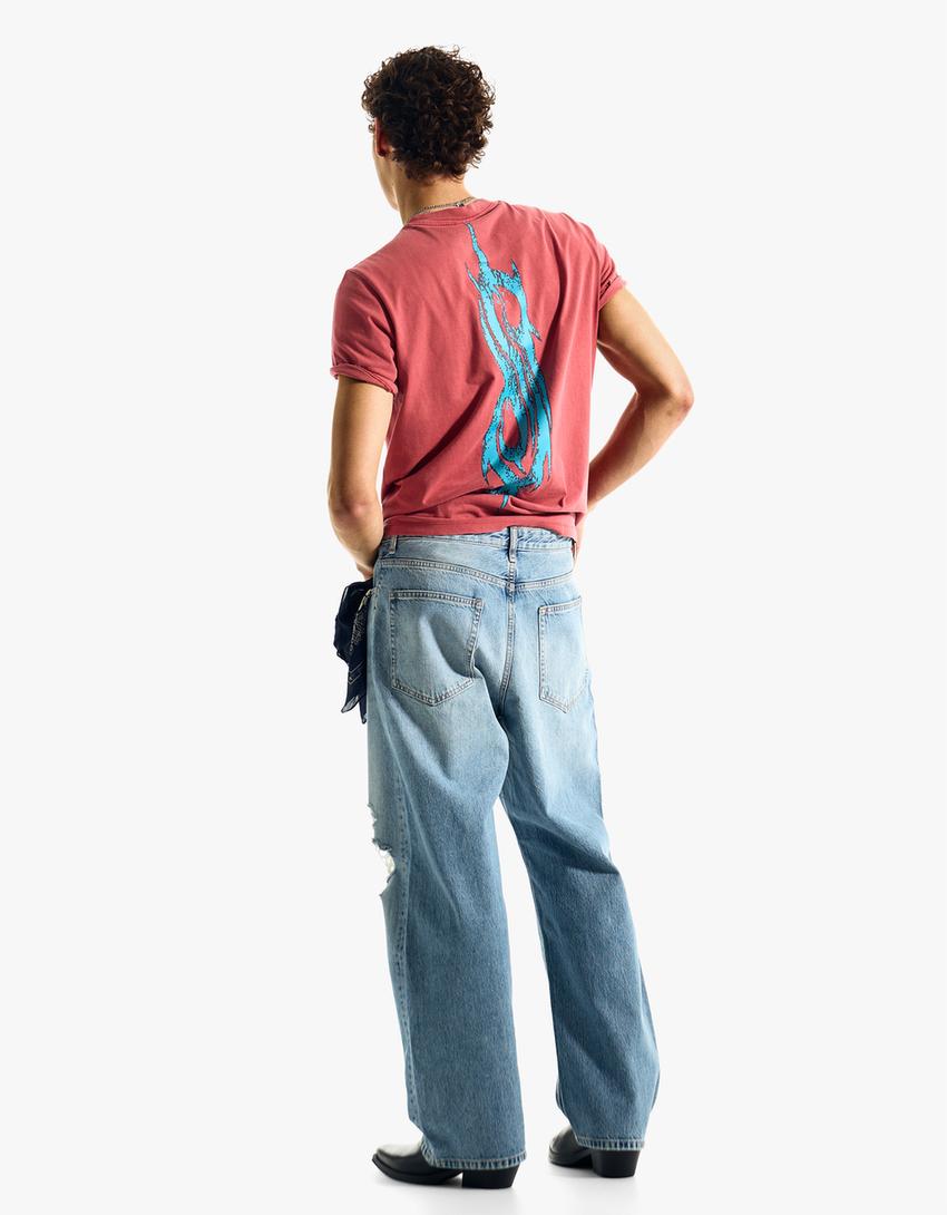 Džinsi ‘baggy fit’ ar plēsumiem-Zils