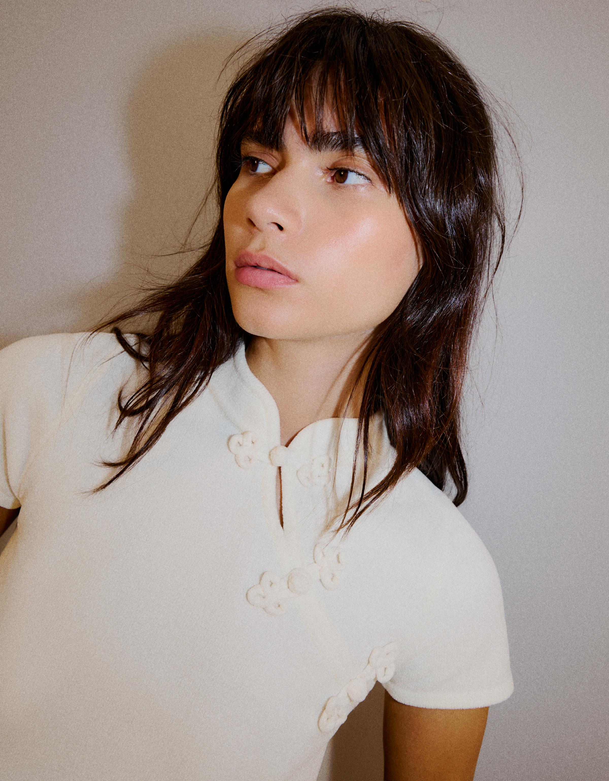 Short sleeve knit jumper with clasps — Cream