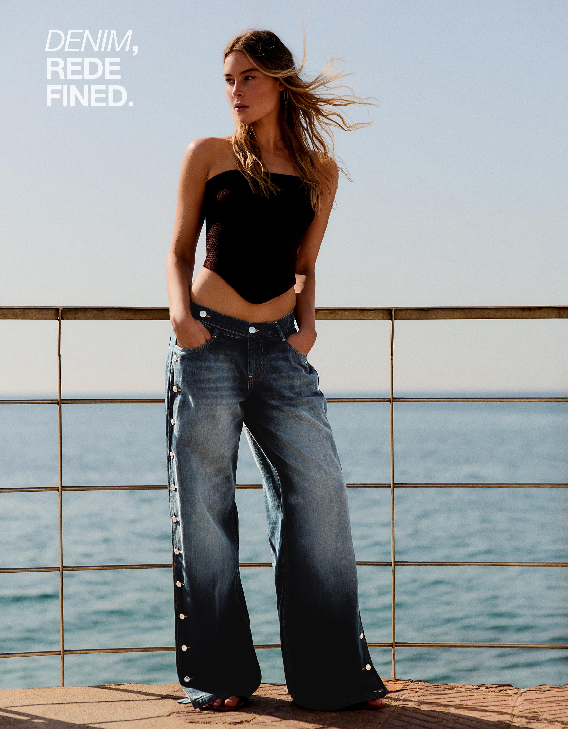 Low-rise straight-leg jeans with side buttons — Dark blue