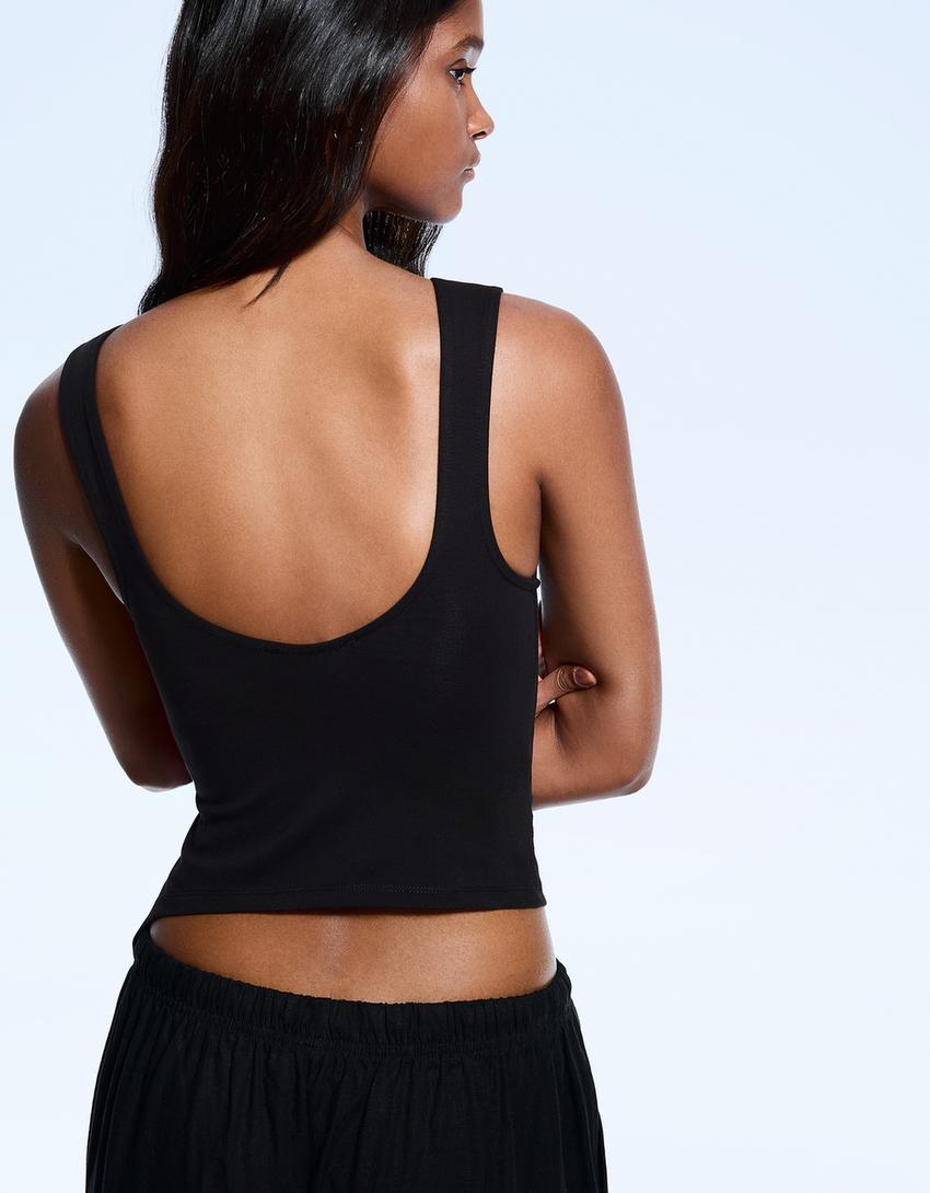 Camiseta sin mangas asimétrica tachas-Negro