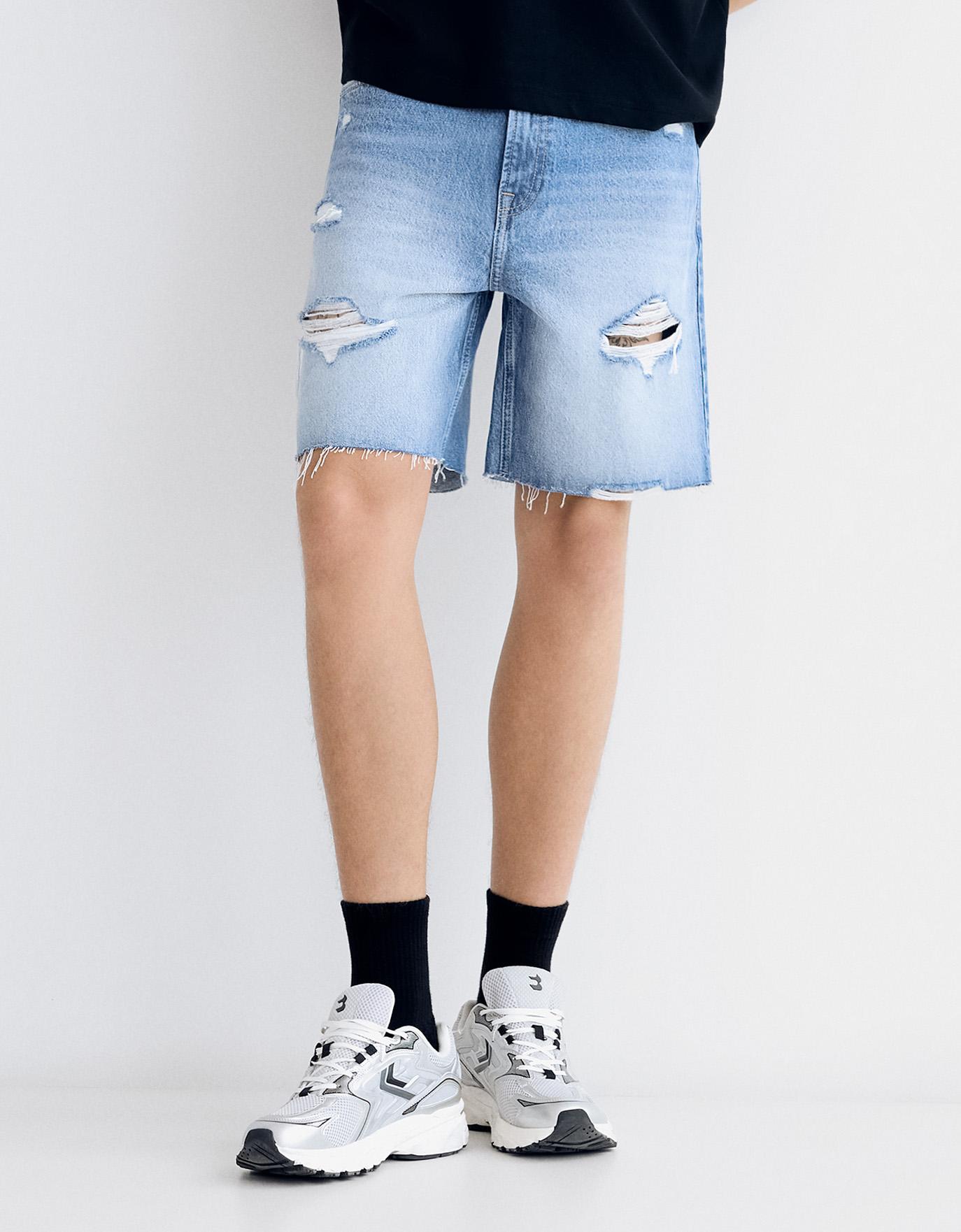 Ripped denim Bermuda shorts — Light blue
