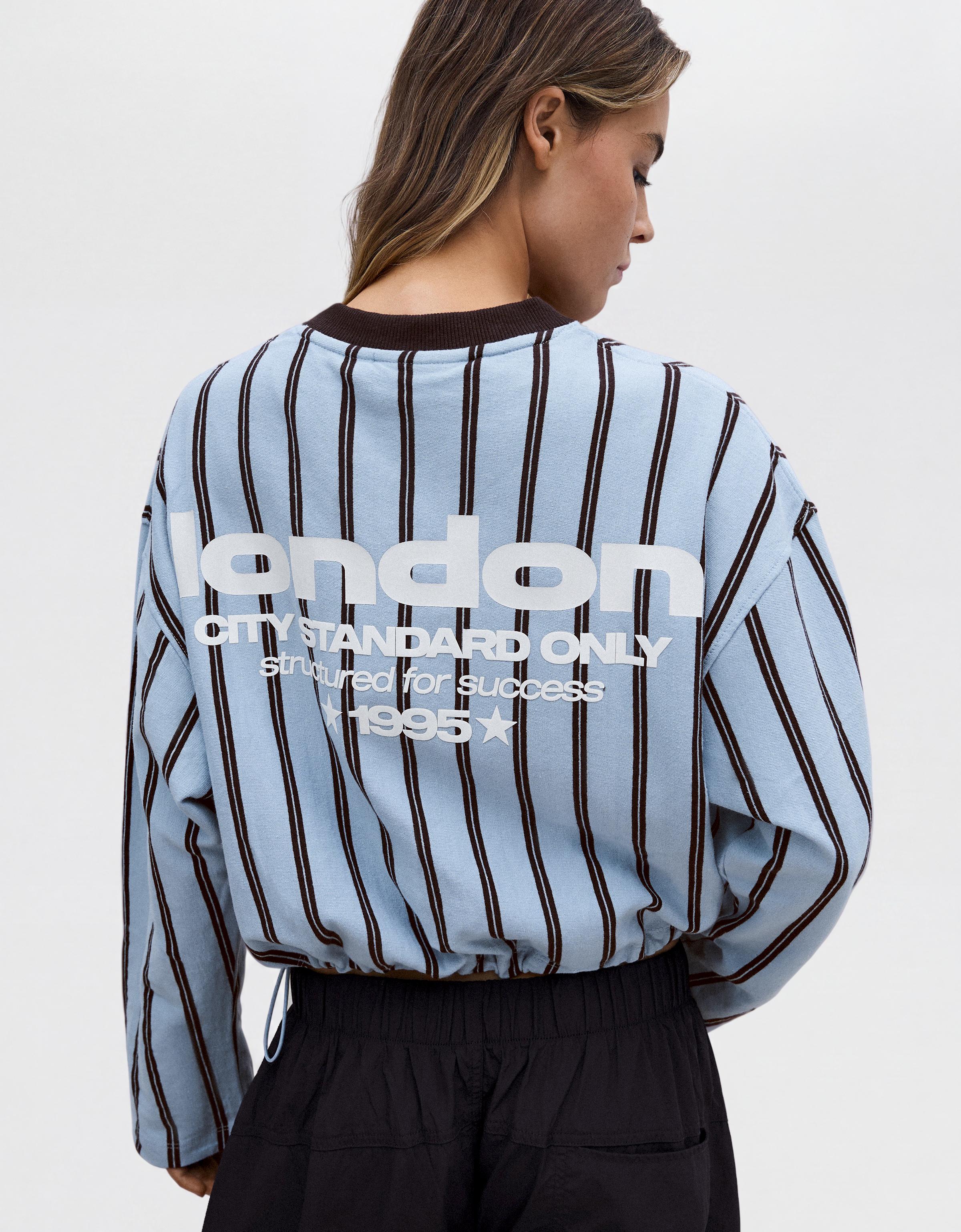V-neck print sweatshirt — Light blue