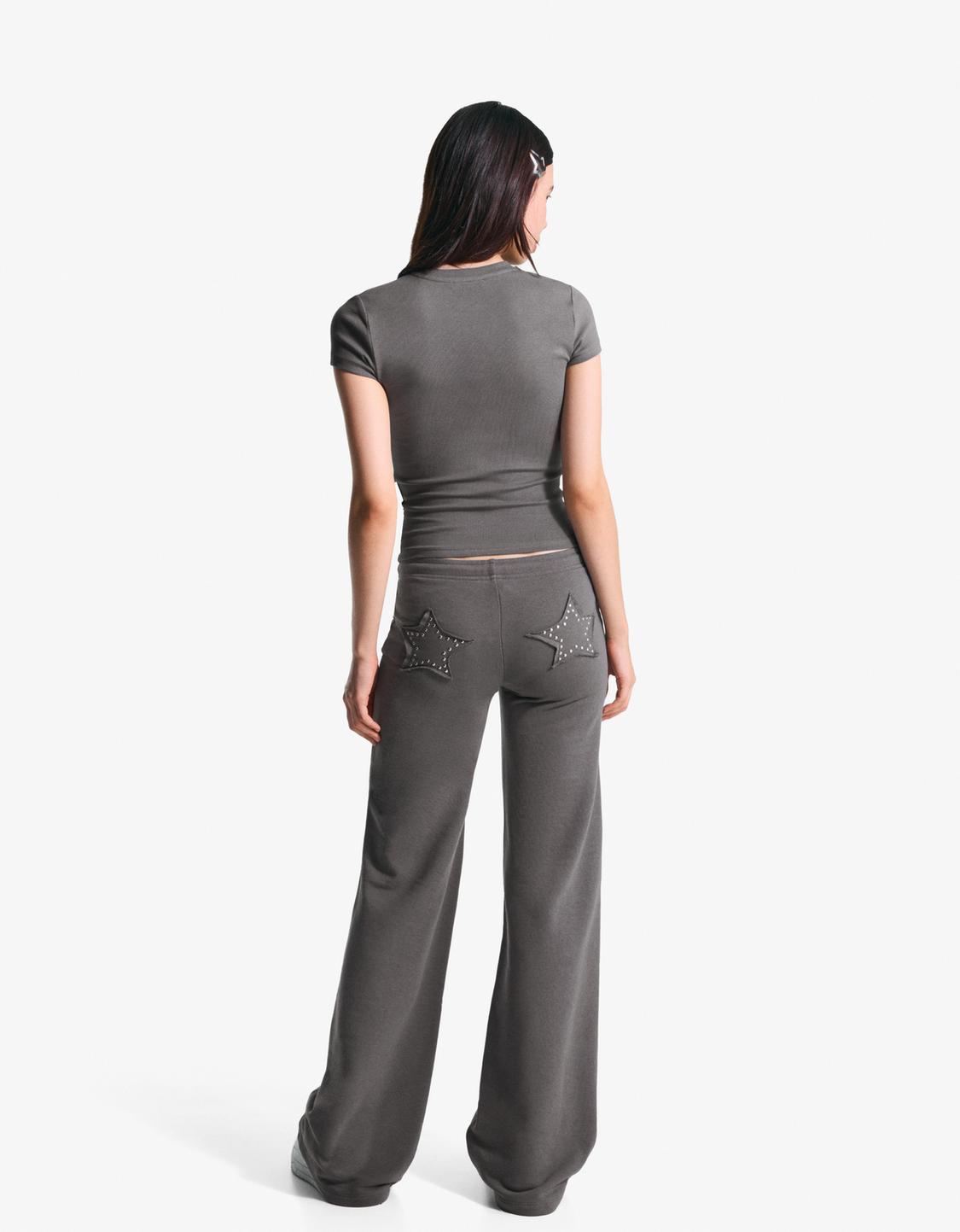 Plush trousers with studs