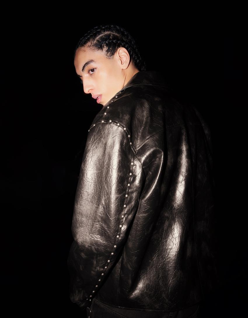 Casaco polipele tachas-Preto