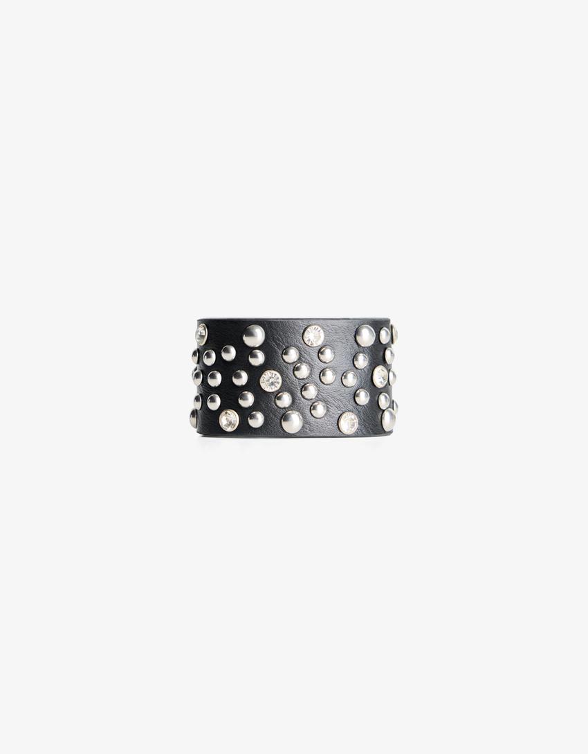 Pulseira com tachas em polipele-Dourado