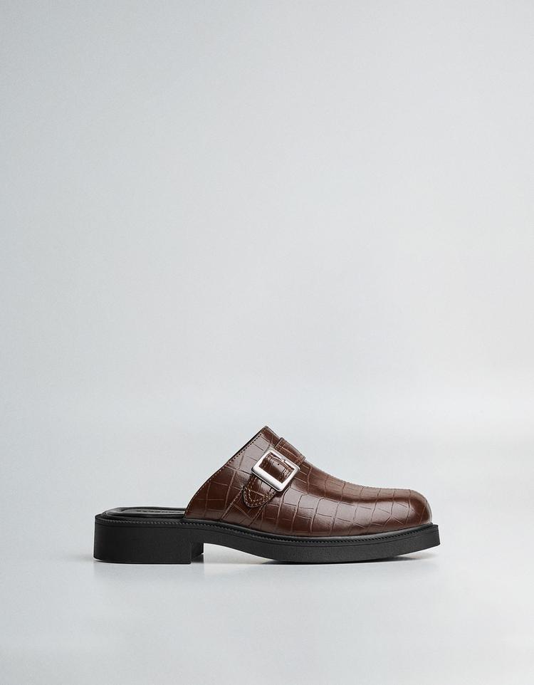 Buckled clogs