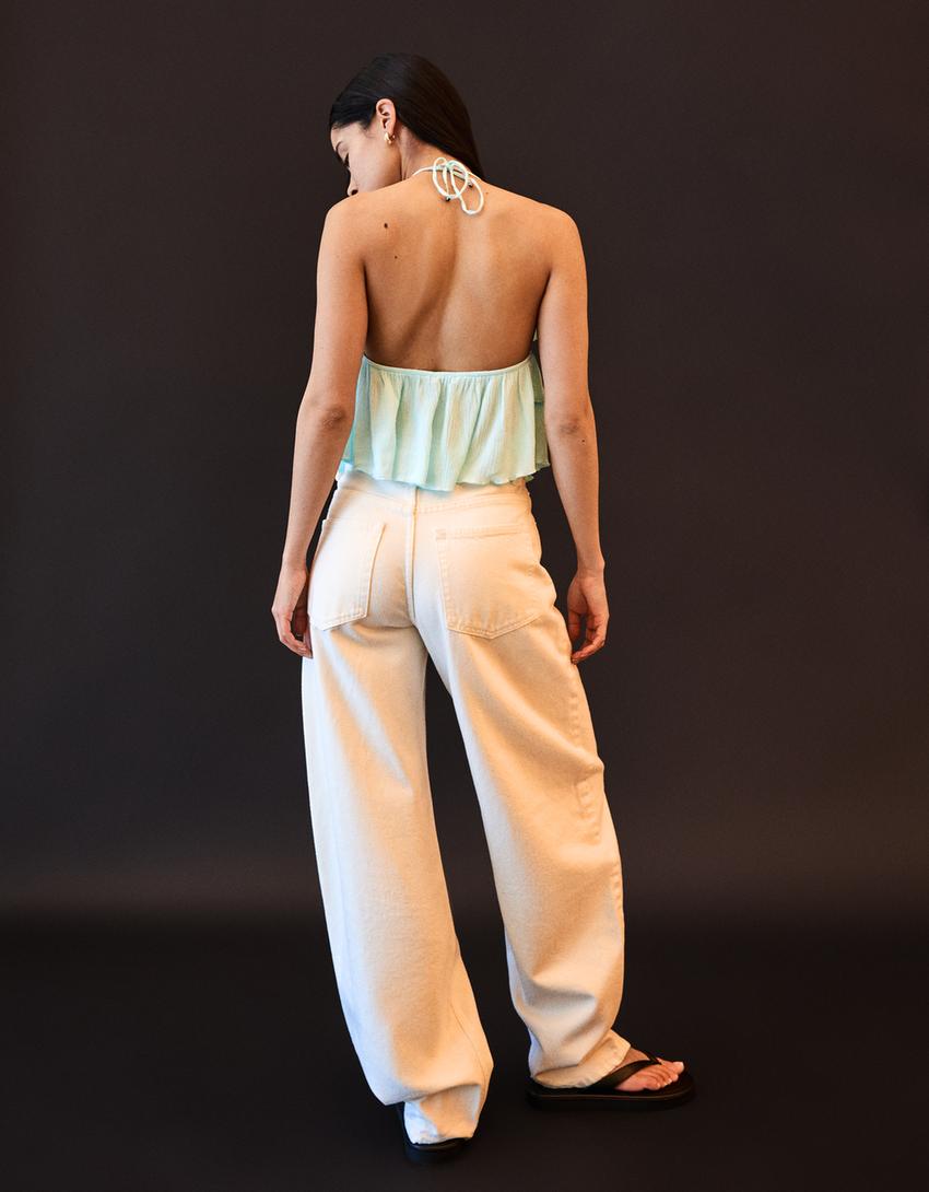 Textured strappy top with ruffles