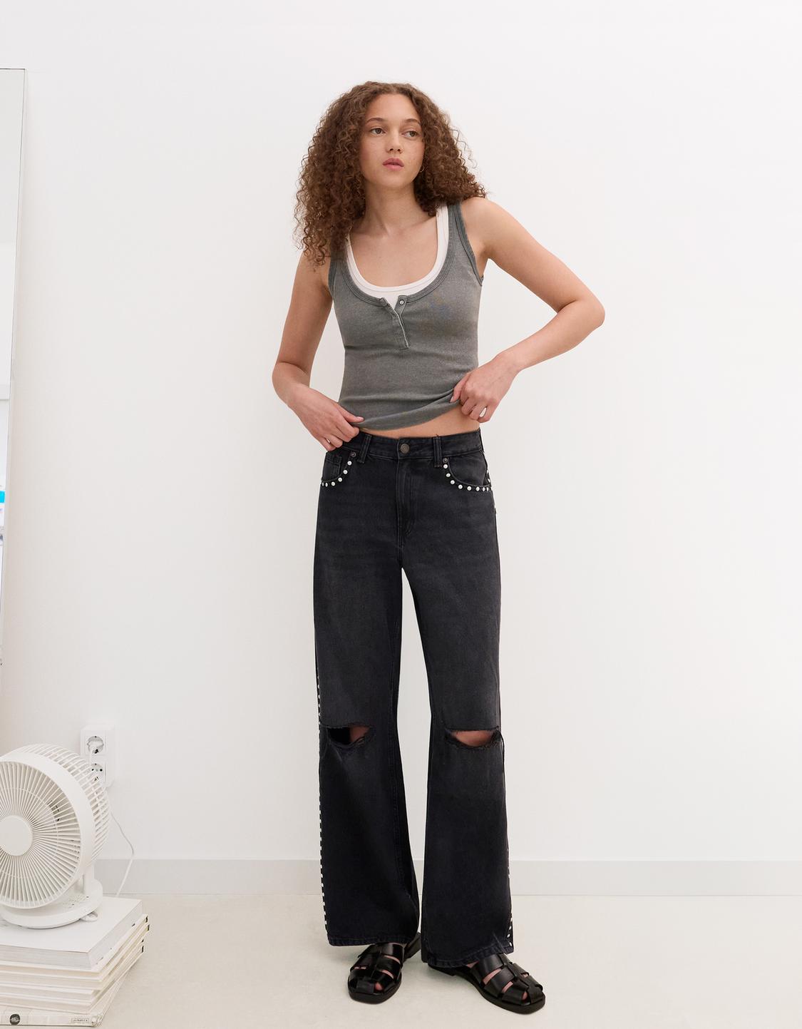 Ripped wide-leg jeans with studs