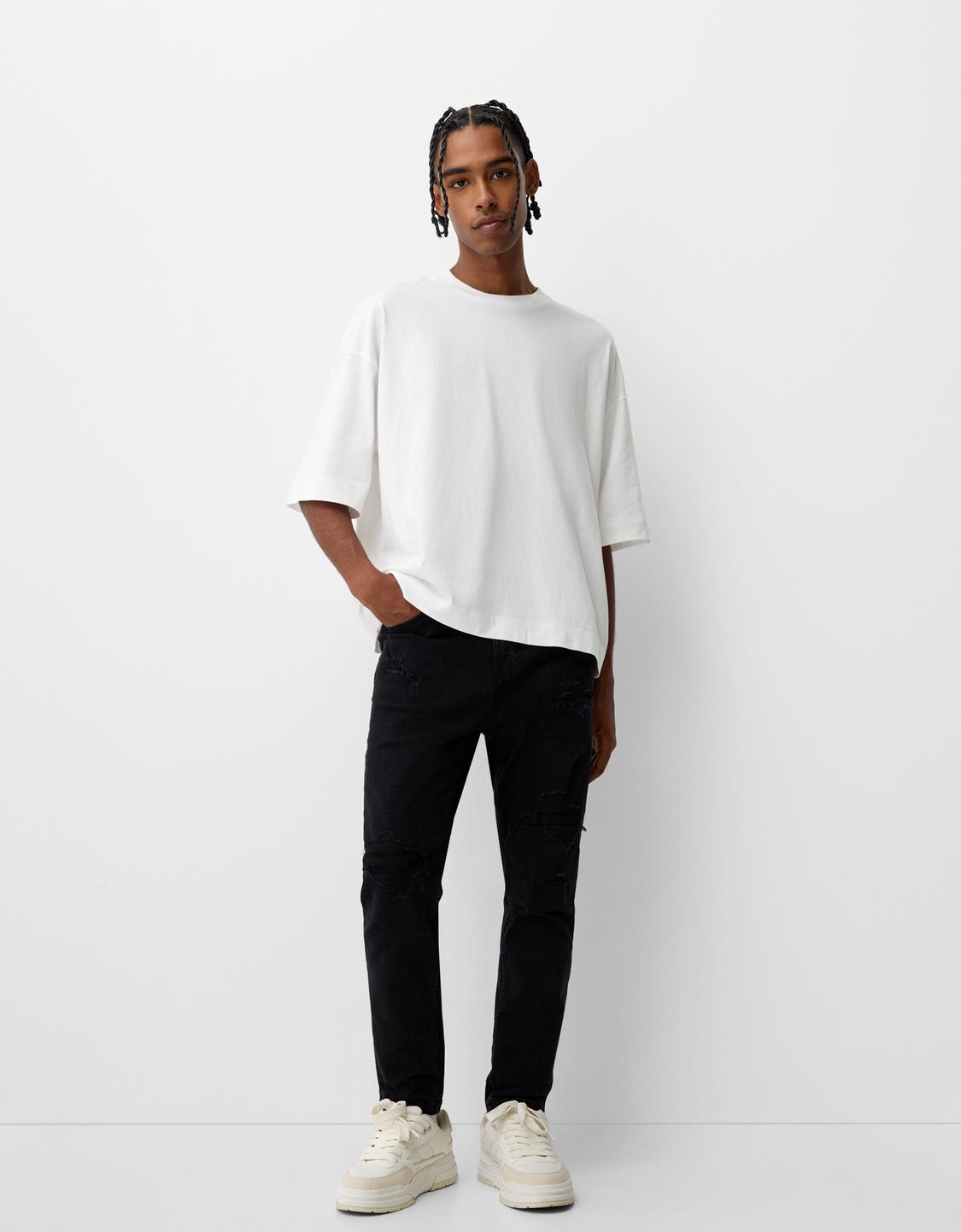 Jeans carrot rotos