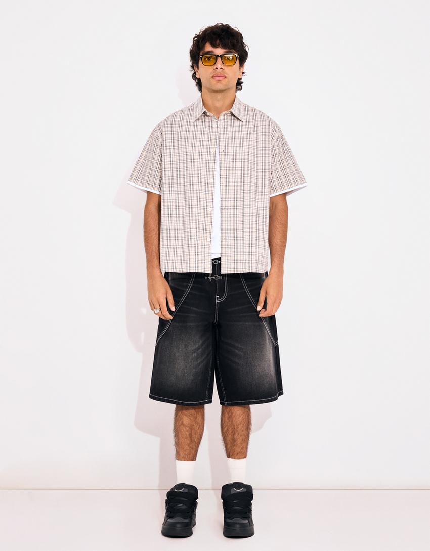 Baggy denimbermudas med duffelknappar-Svart
