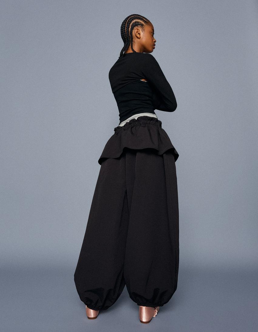 Technical trousers with peplum waist-Black