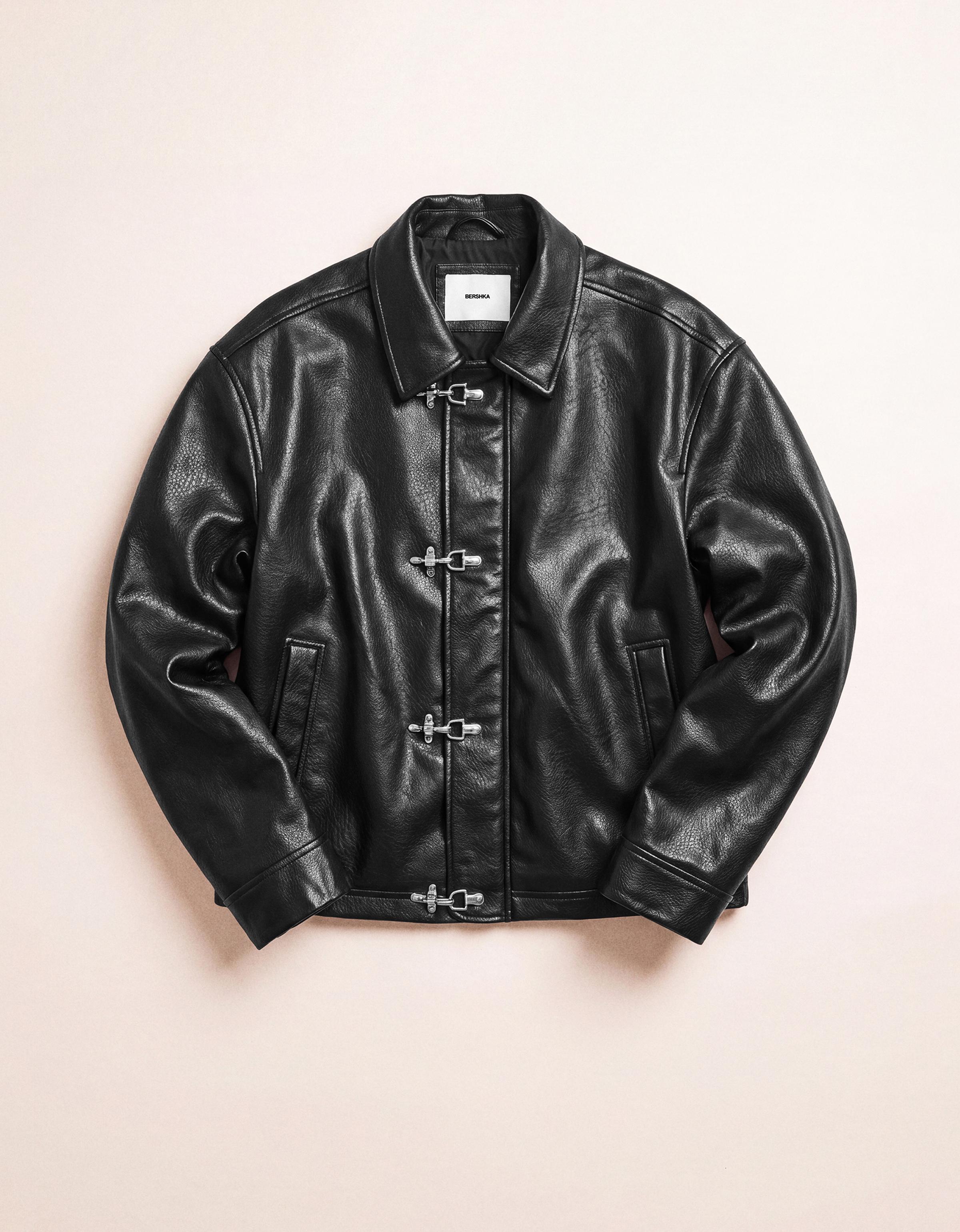 Leather effect jacket with clasps — Black