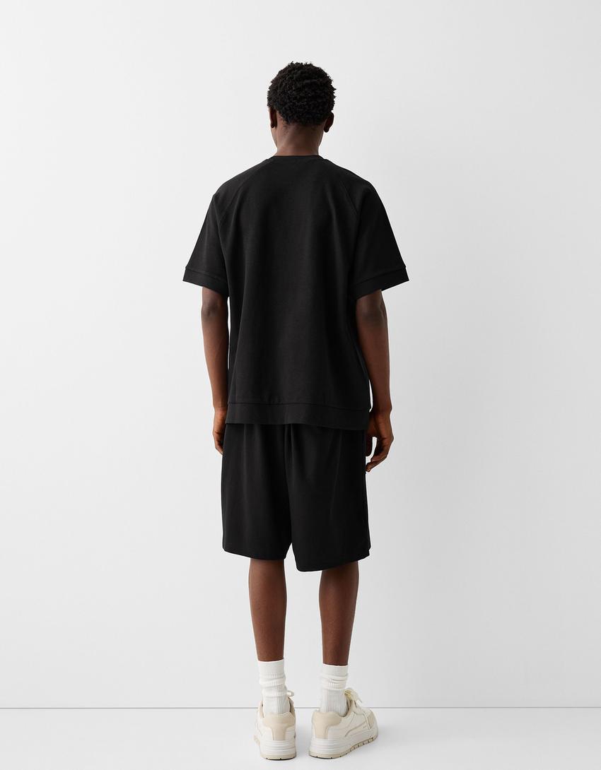 Interlock boxy fit short sleeve T-shirt-Black-1