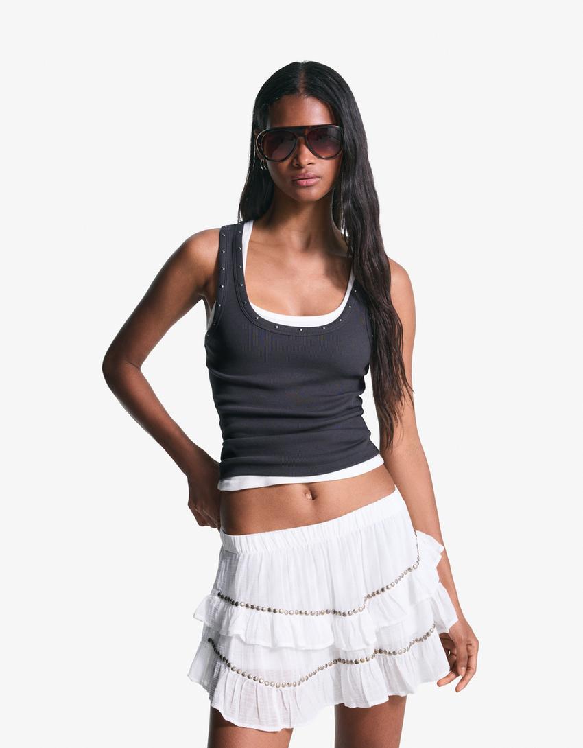 Ruffled mini skirt with studs-White