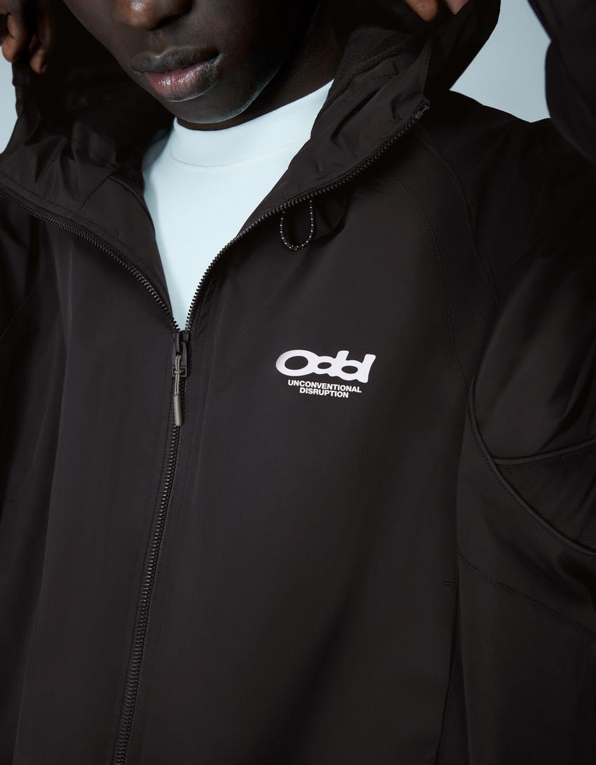 Cazadora técnica capucha-Negro