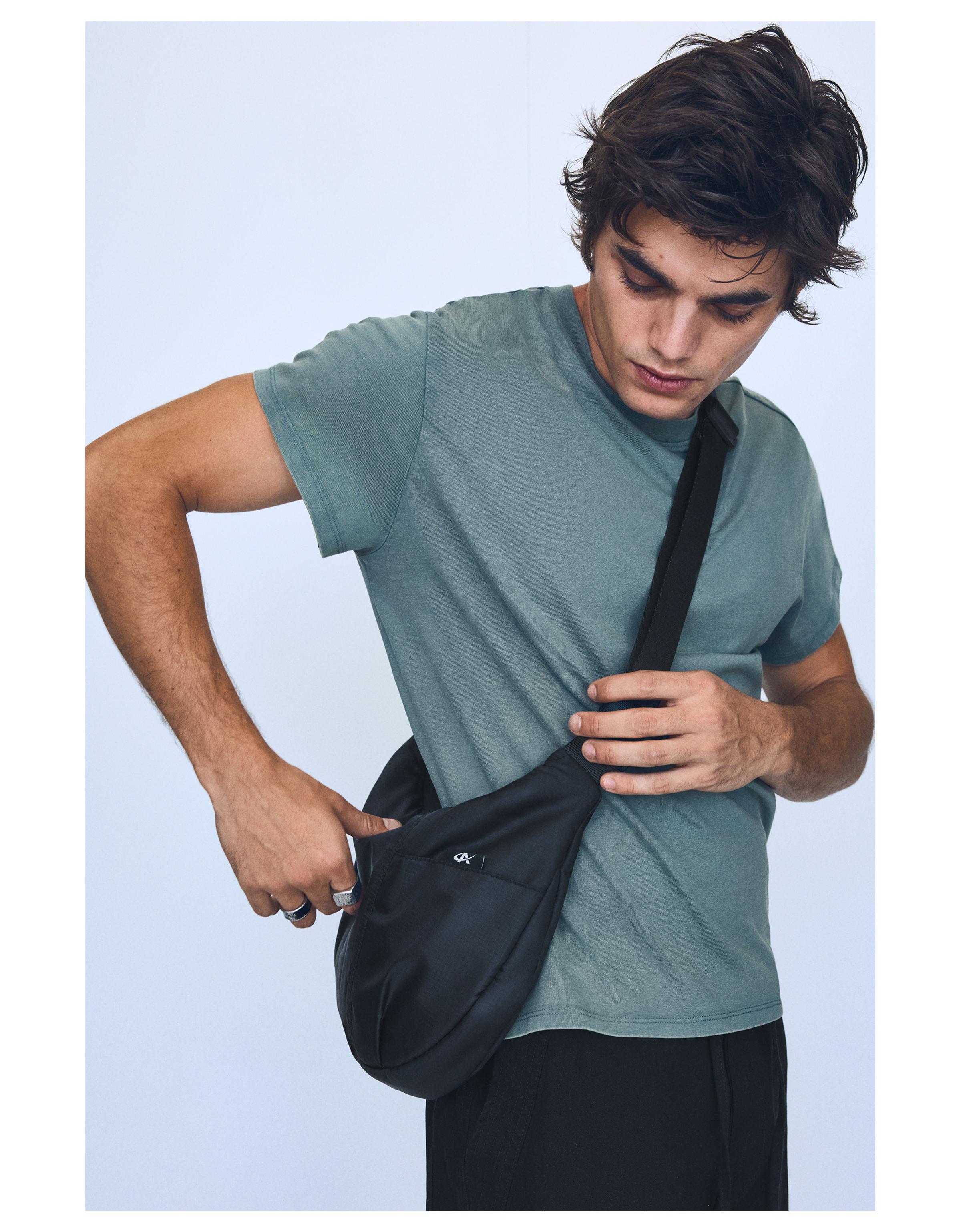 Technical multi-pocket bucket bag — Black