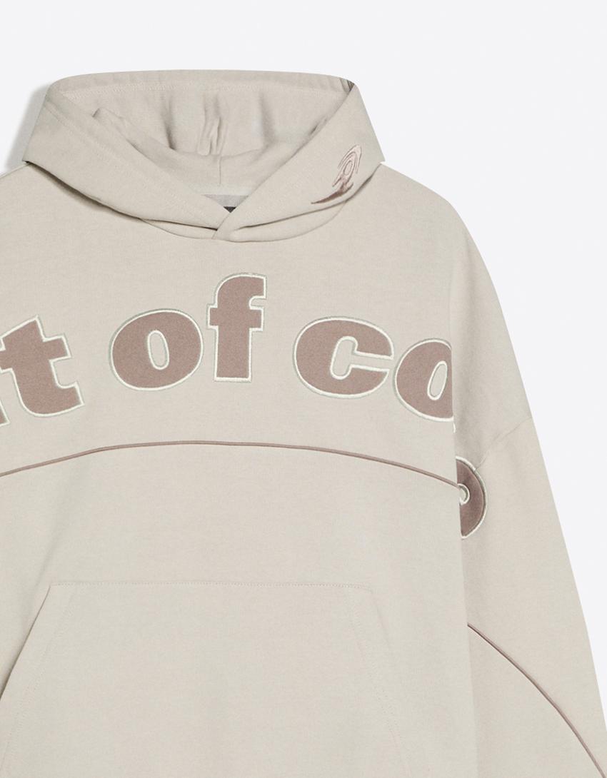 Sudadera capucha print OUT OF CORE-Piedra