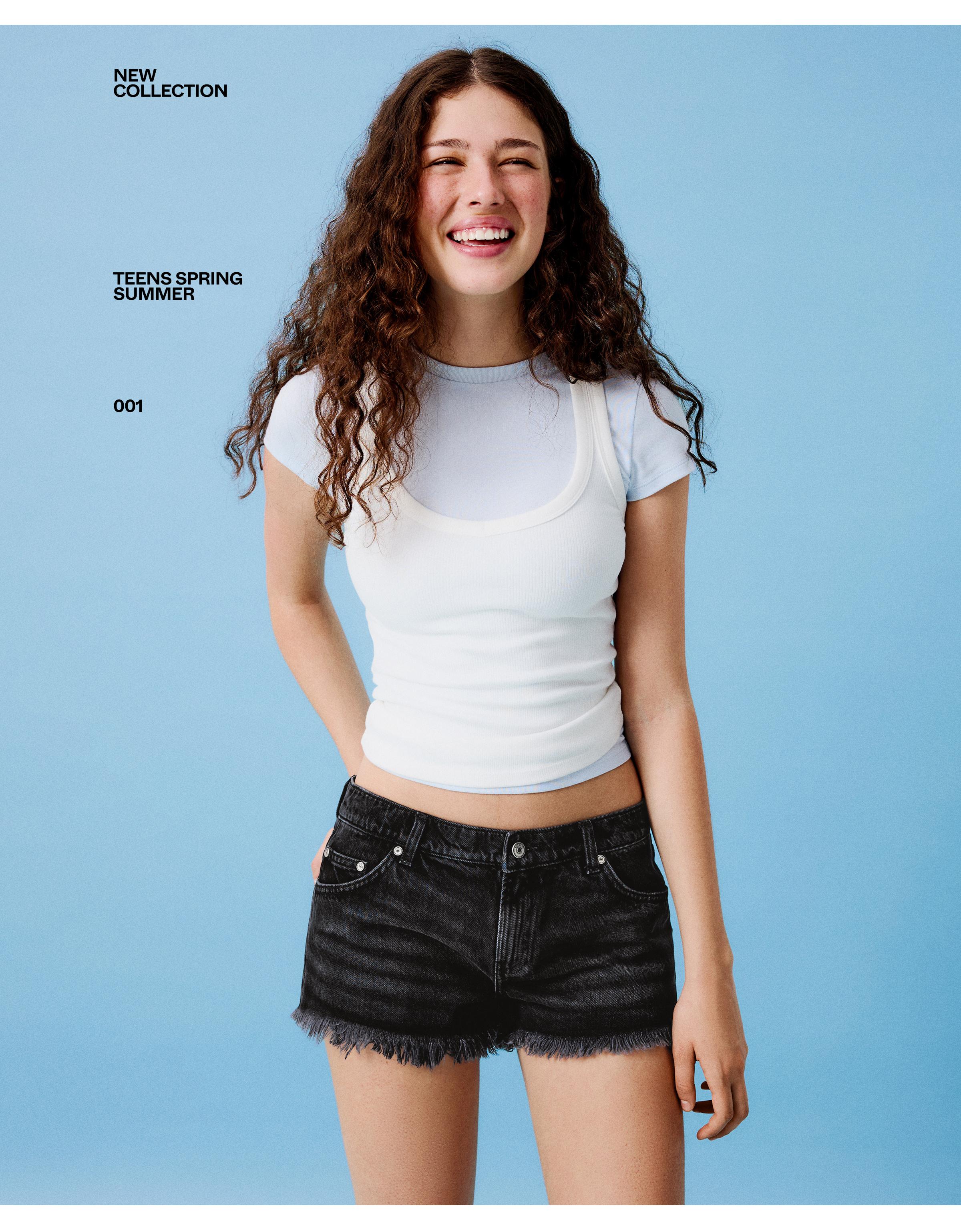 Denim mini shorts with frayed hem — Black