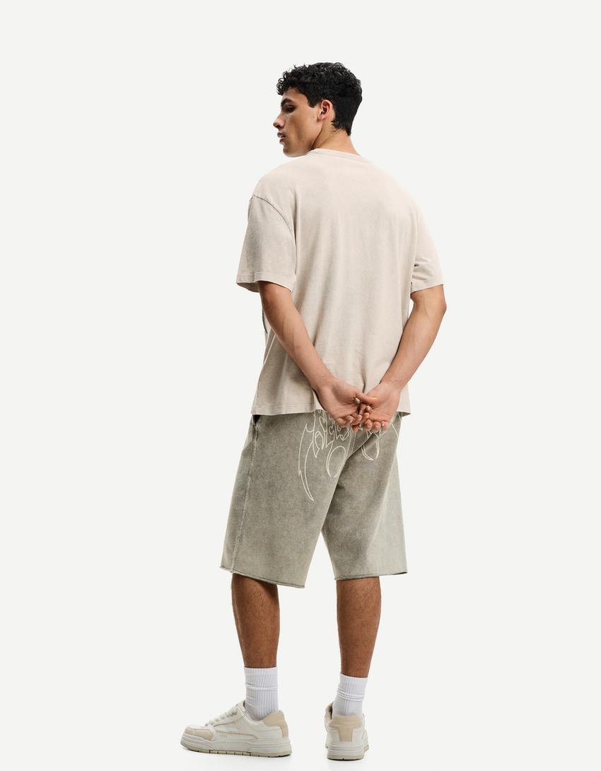 Faded-effect baggy Bermuda shorts