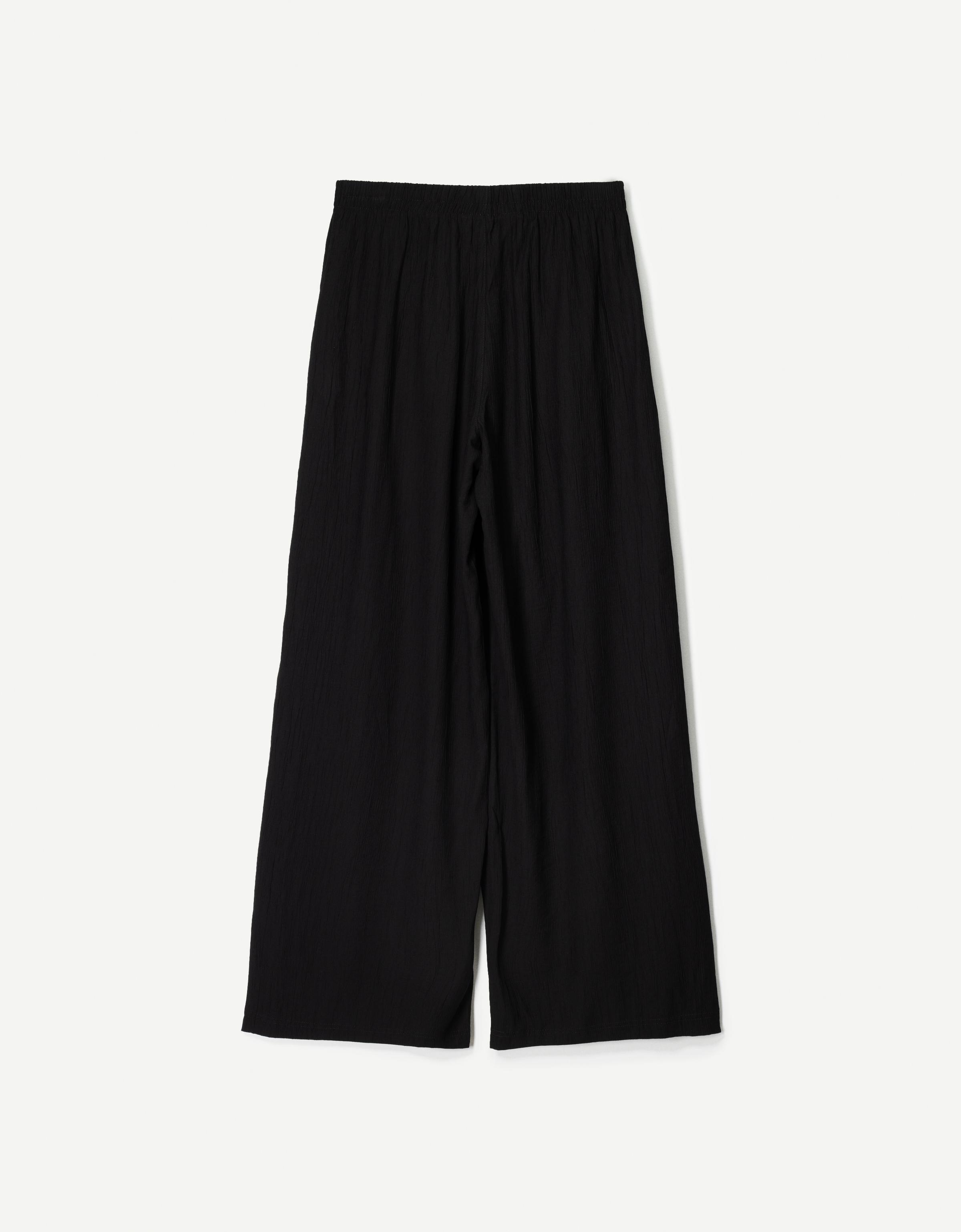 Flowing wide-leg textured trousers with drawstring — Black