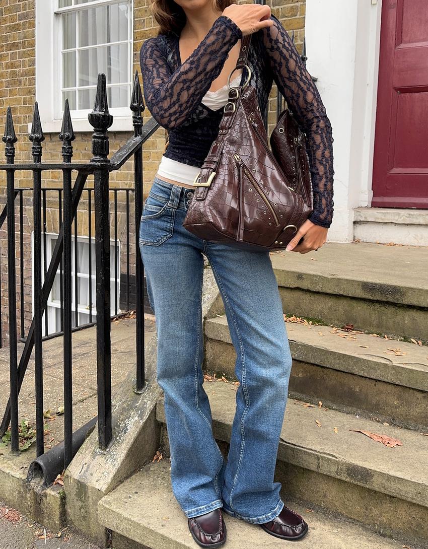 Jeans model berkibar dengan saku disulam-Biru