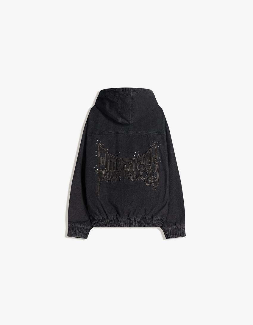Caçadora denim tatxes-Negre