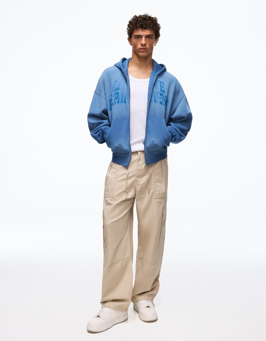 Hoodie in Washed-Optik mit Print-Blau