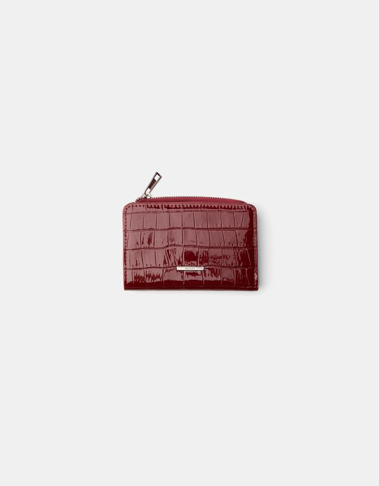 Embossed faux-patent-finish animal print purse