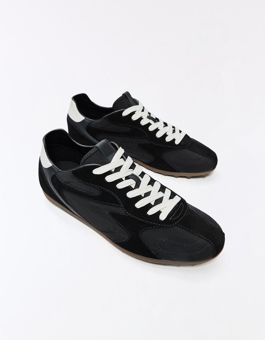 BUTY SPORTOWE RETRO NA CIENKIEJ PODESZWIE-Czarny