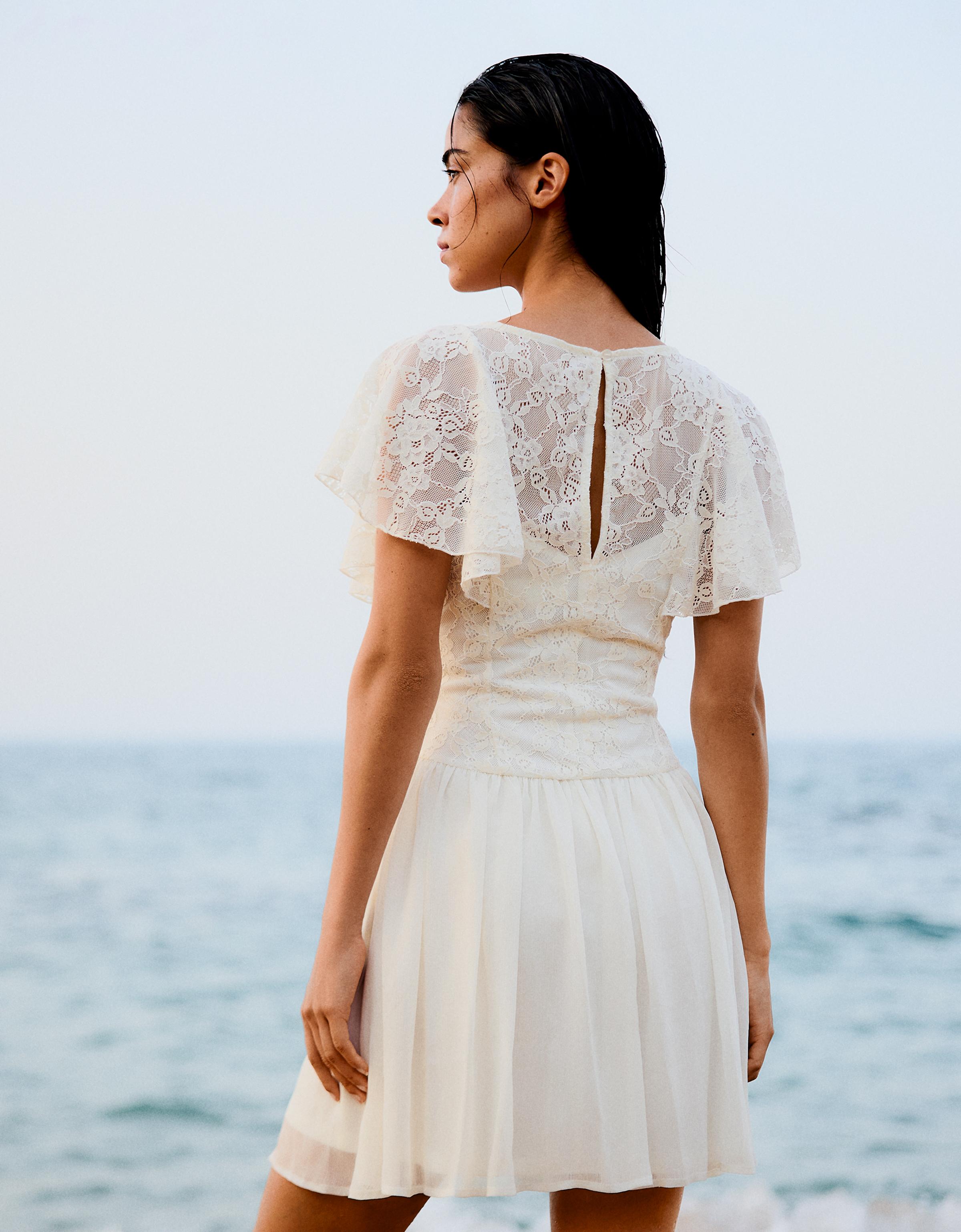 Cape sleeve mini dress — Cream