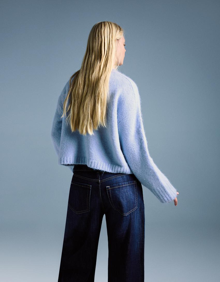 سويتر فضفاض برقبة على شكل V-أزرق