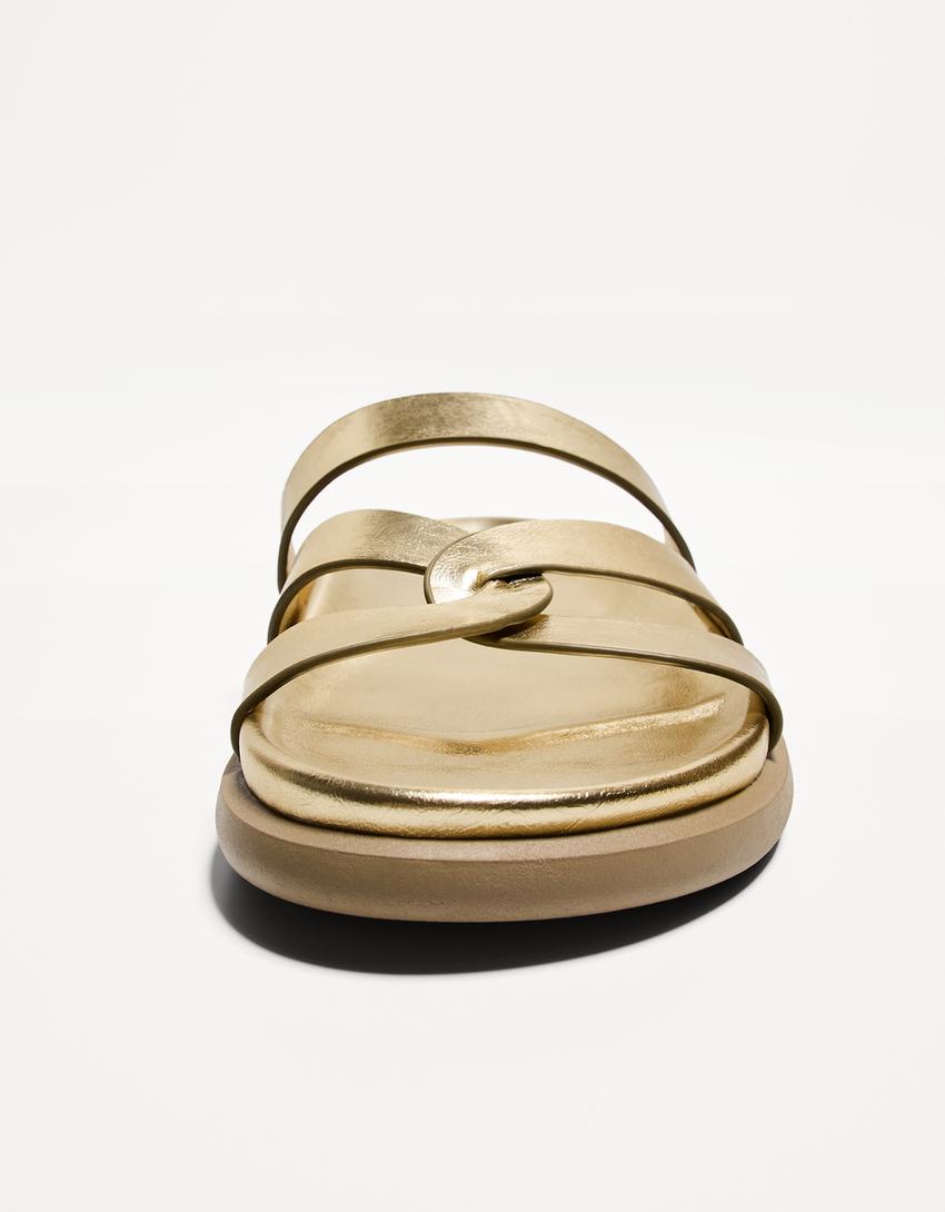 Flade sandaler med flere remme-Guld