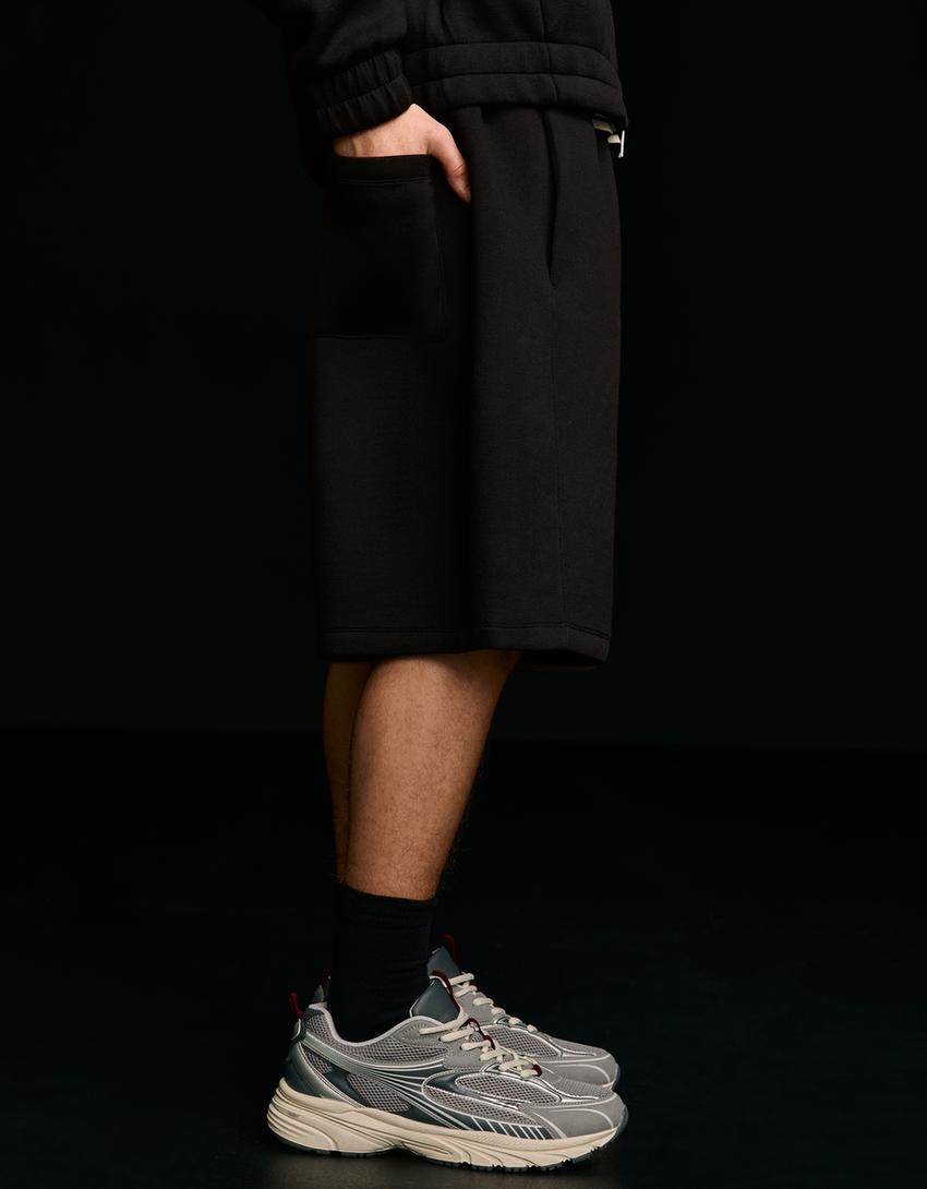 Oversize neoprene Bermuda shorts-Black