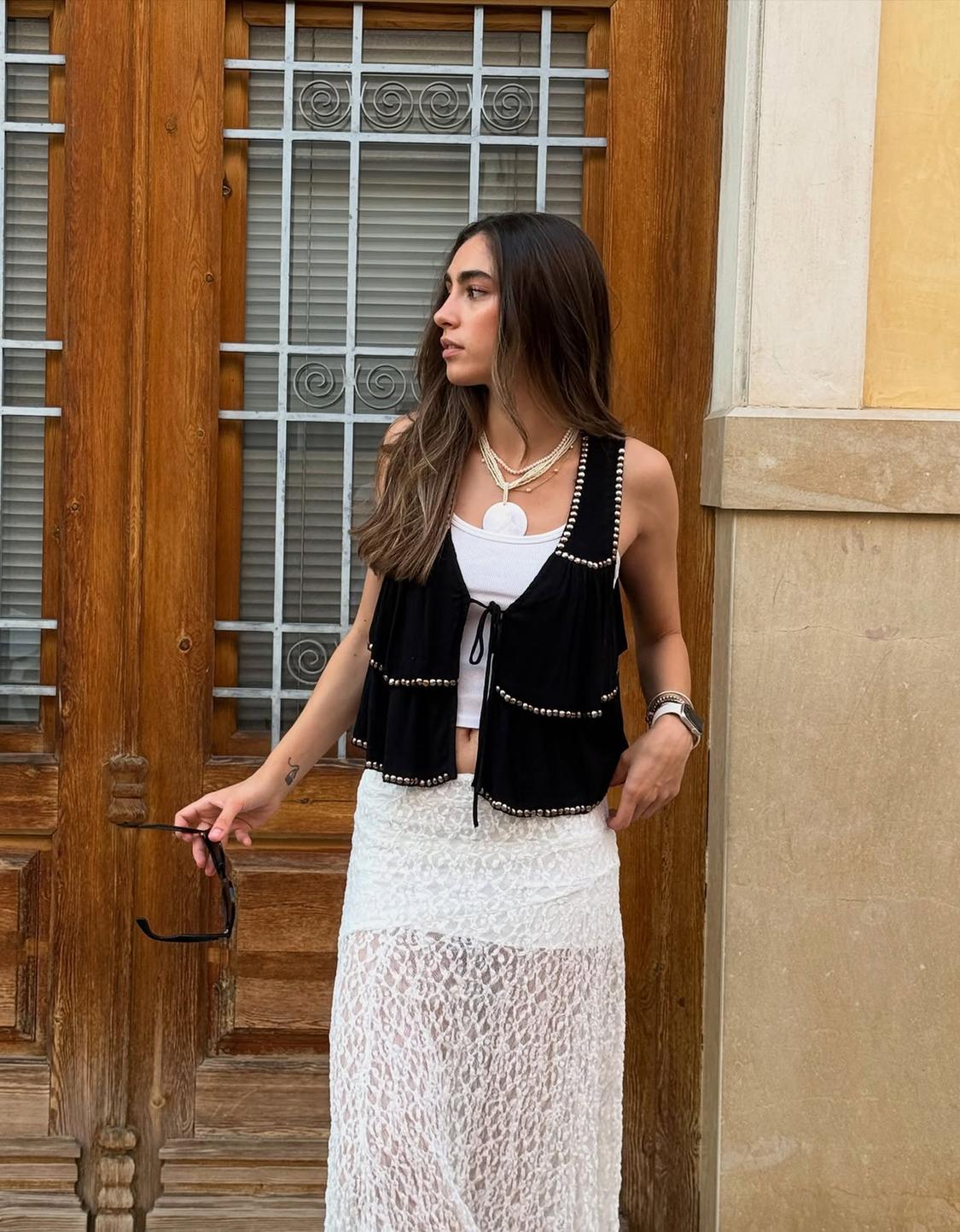Ruffled waistcoat with studs