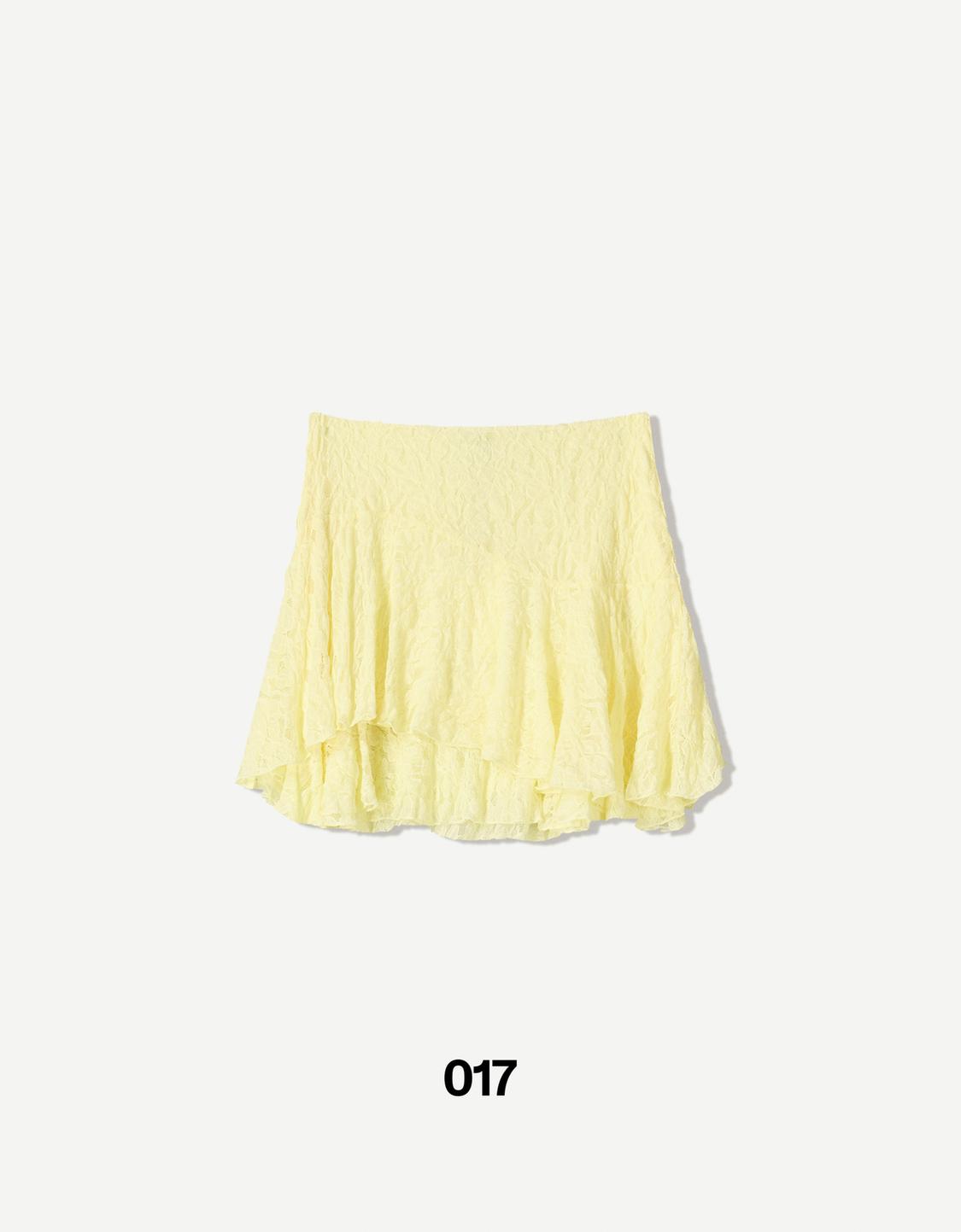 Ruffled blonde lace mini skirt