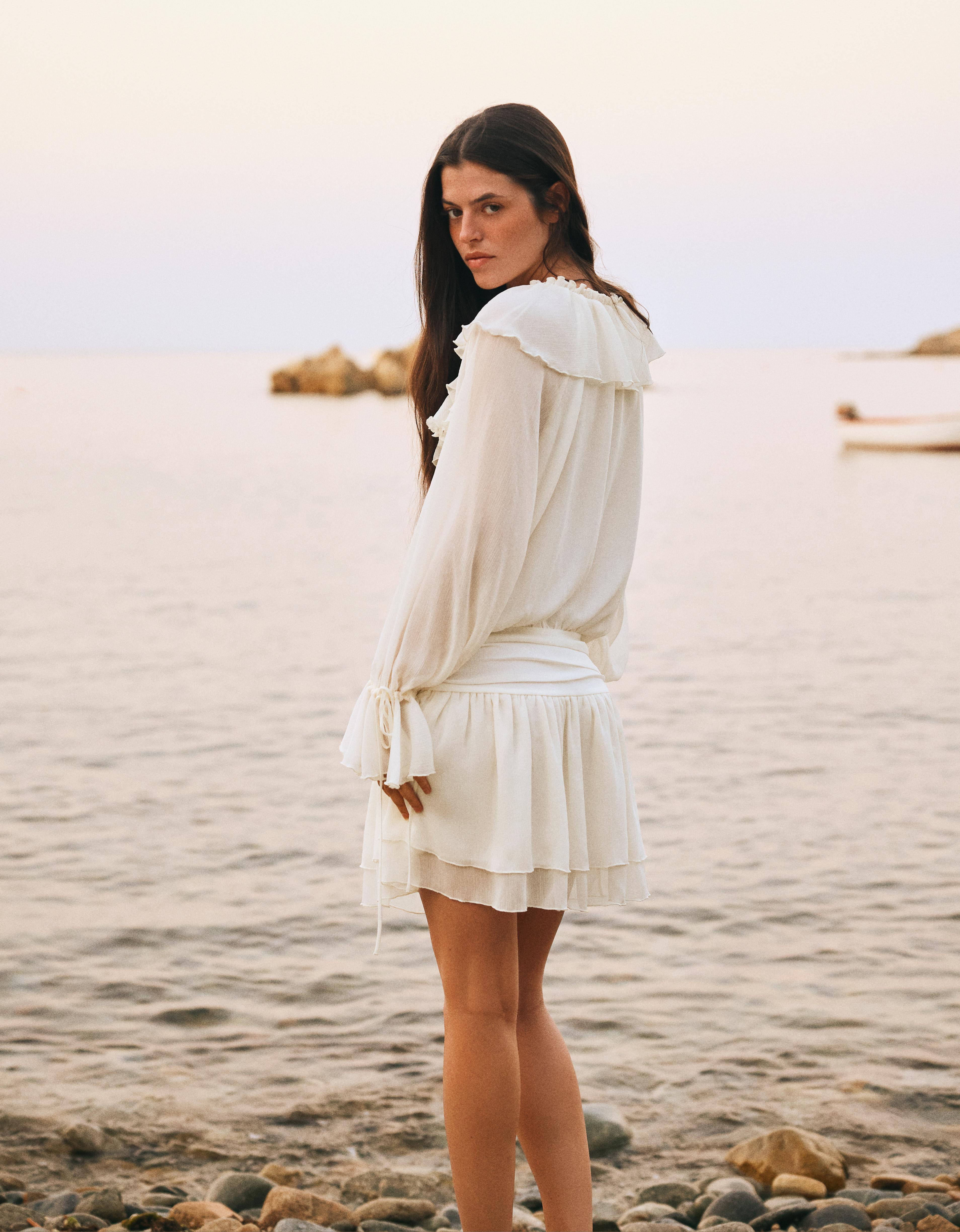 Mini dress with ruffles — White