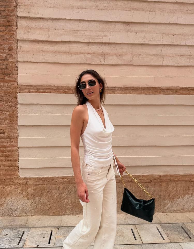 Asymmetric draped top with ring detail